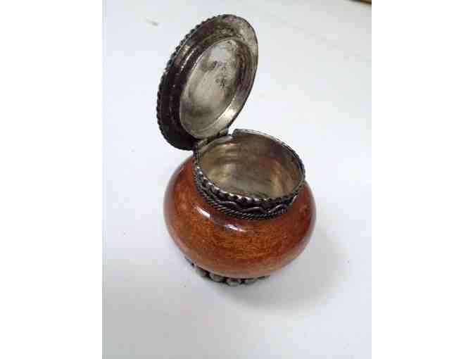 Amber-colored stone pot with lid