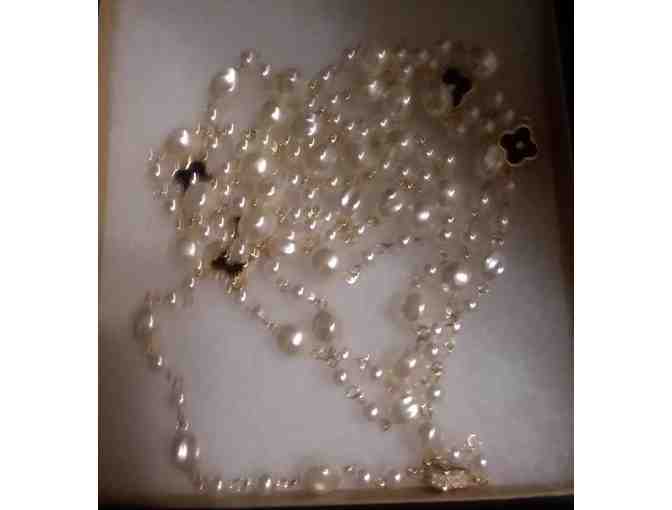 Long strand simulated pearl and rhinestone necklace