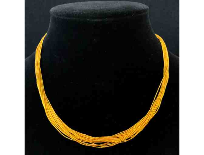Set of two golden fine multi-strand necklaces