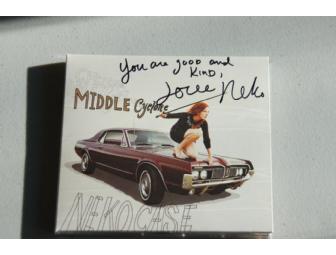 Signed poster, CD and a t-shirt from Neko Case