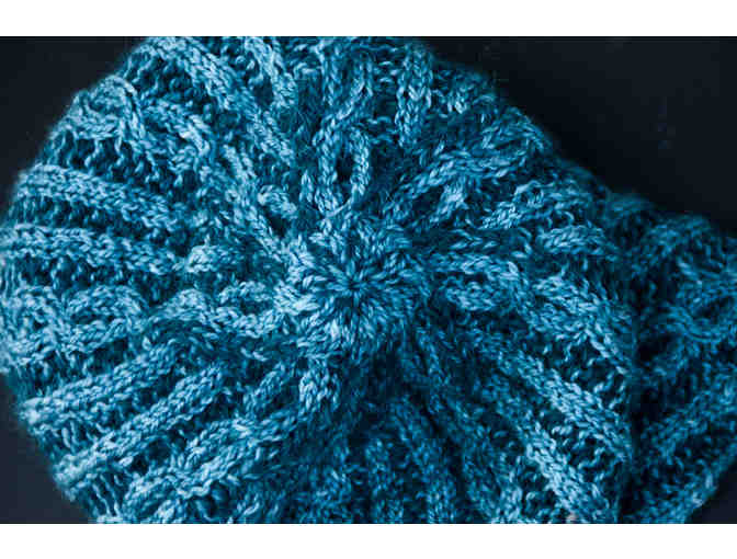 Blue beanie hat with cables