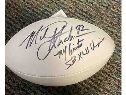 Autographed football by Michael Strahan, Defensive End for 15 years with the NY Giants
