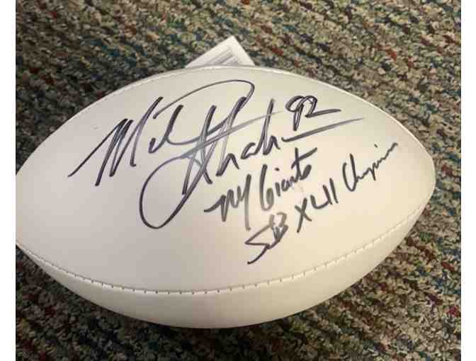 Autographed football by Michael Strahan, Defensive End for 15 years with the NY Giants - Photo 1