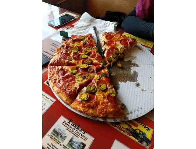 Grab a Slice at Roger's Pizza - Photo 1