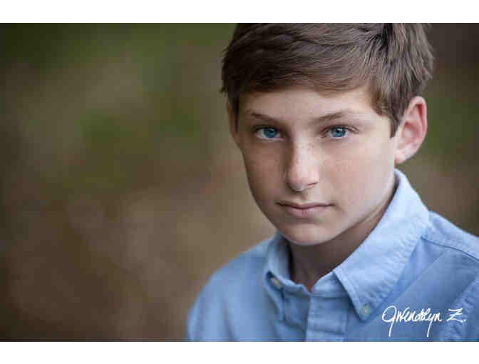 Portrait Session, plus a $400 Gift Certificate toward Wall Print