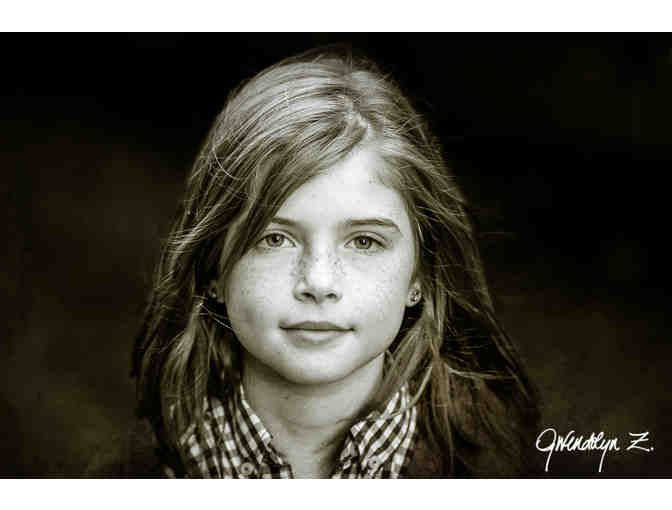 Portrait Session, plus a $400 Gift Certificate toward Wall Print