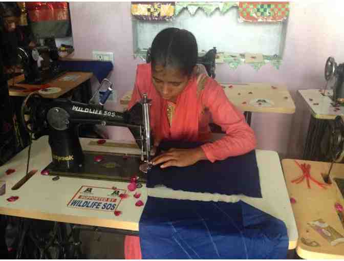 Small patchwork purses and keychain handmade by Kalandar women