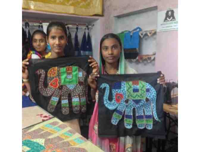 Buy a sewing machine for Kalandar women