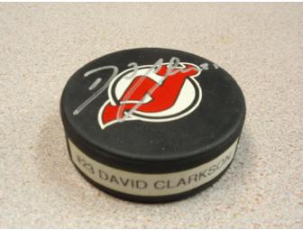 2 Signed Pucks by New Jersey Devils Players Adam Mair & David Clarkson