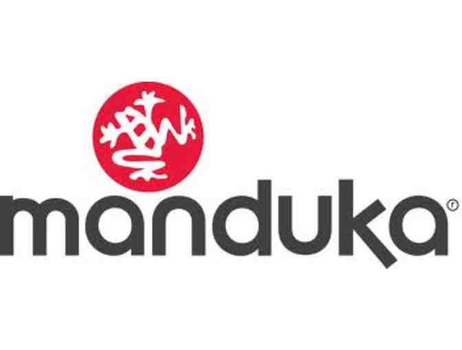 Manduka yoga mat and Athleta yoga bag full of goodies!