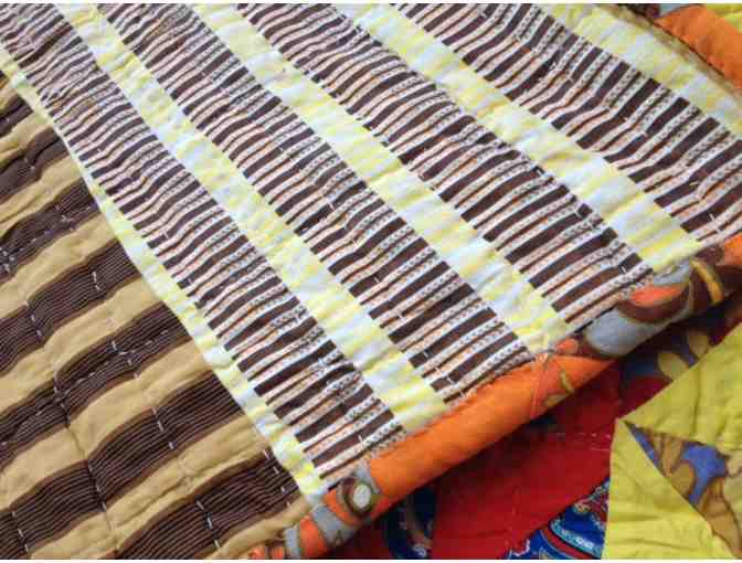 Beautiful hand-pieced vintage quilt with classic pinwheel pattern